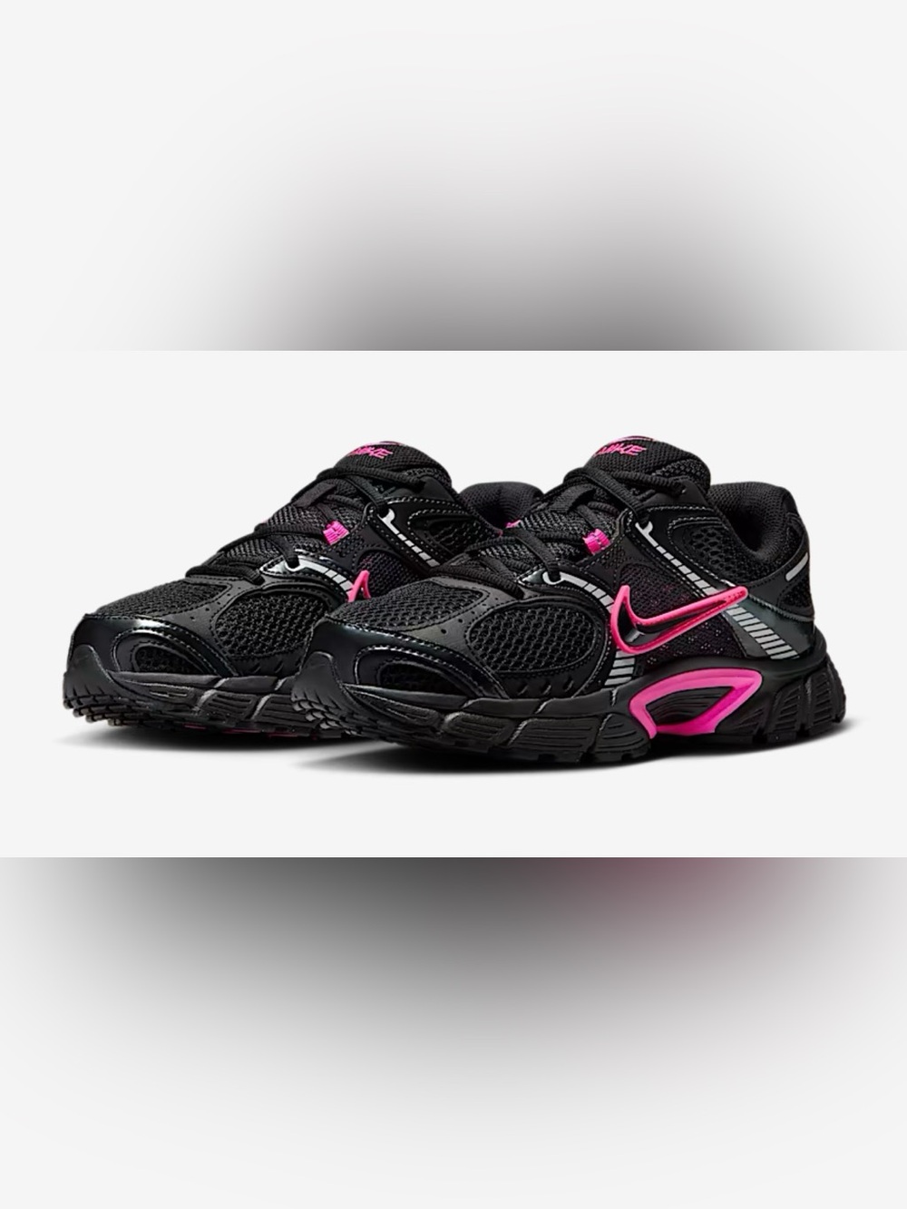 Nike Women’s Black Sneakers with Pink Accents